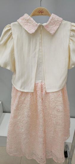 صورة طقم تيور الانيق بياقة مطرزة وتنورة دانتيل كلوش